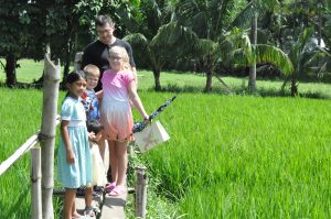 crossing-a-narrow-bridge-on-the-way-to-cherrys-house-andreasen-familys-sponsored-child-in-manapla-school